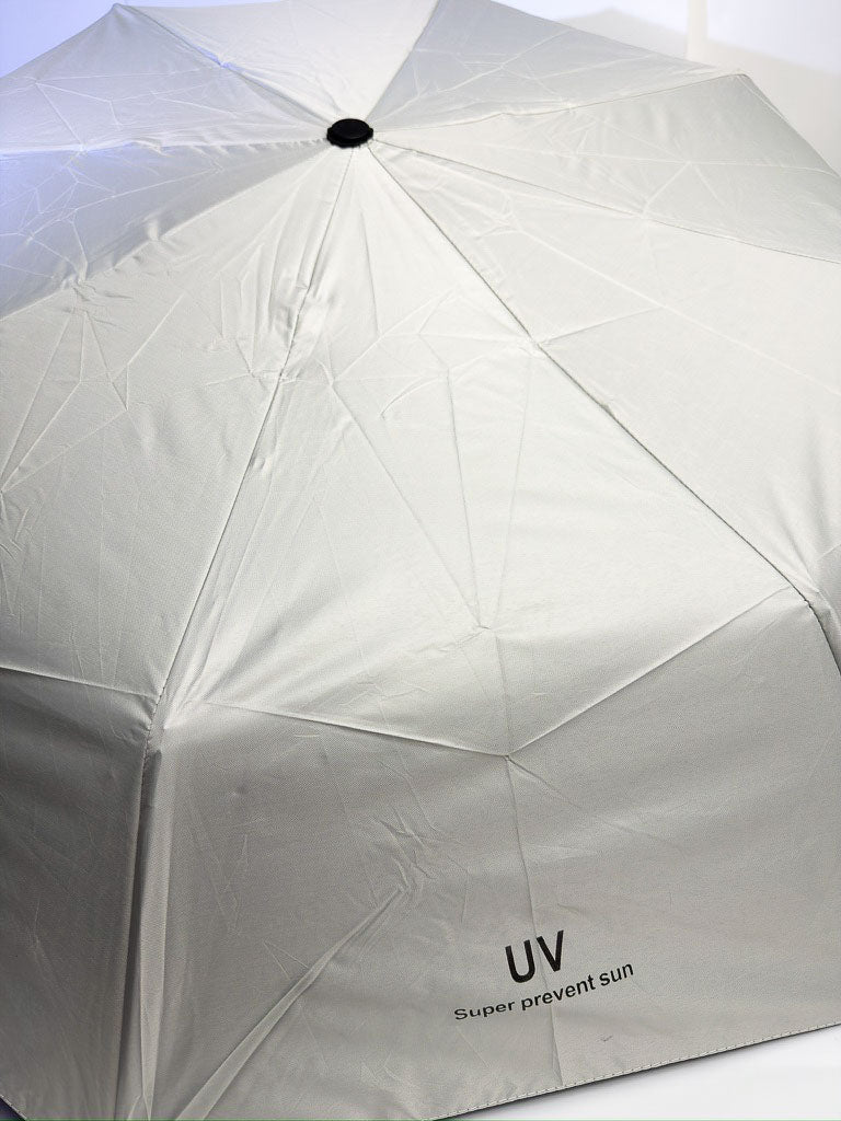 Parapluie anti-UV beige pour le pèlerinage, vue de la toile anti-UV